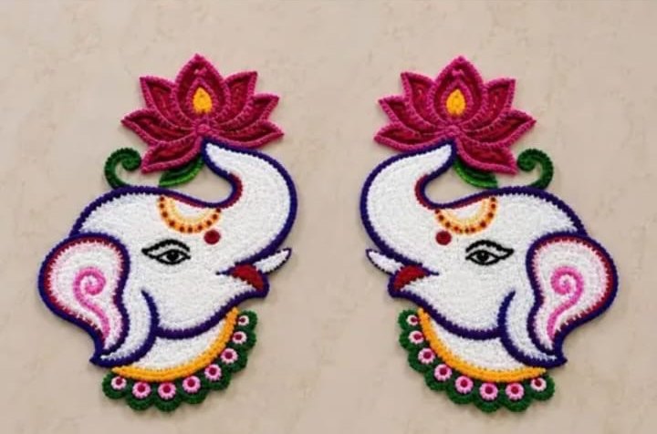 Ganesha rangoli pair with lotus crowns